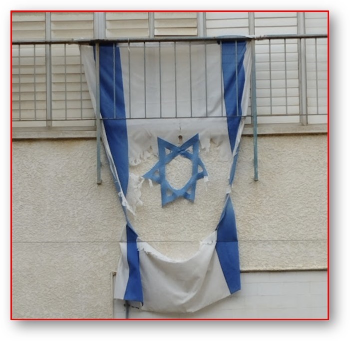 הדגל הקרוע כמשל על עצמנו